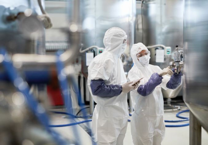 GMP Manufacturing Capacity Image of 2 scientists