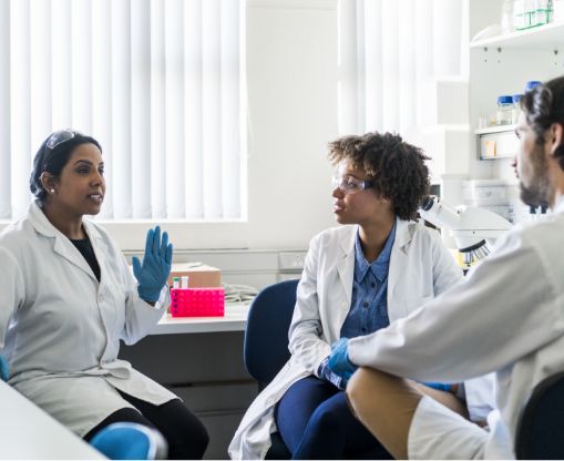 Careers Our Culture Photo of Small Group of Scientists talking